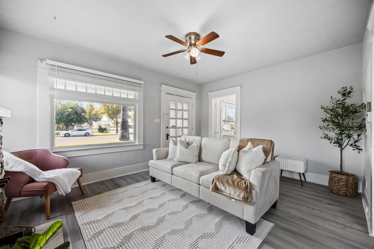 4001 East Balch Avenue Fresno, CA 93702 - Photo 5 of 22 a living room with furniture and a large window