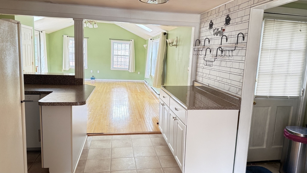118 Spruce Road Norwood, MA 02062 - Photo 13 of 39 a view of hallway with stairs and a window