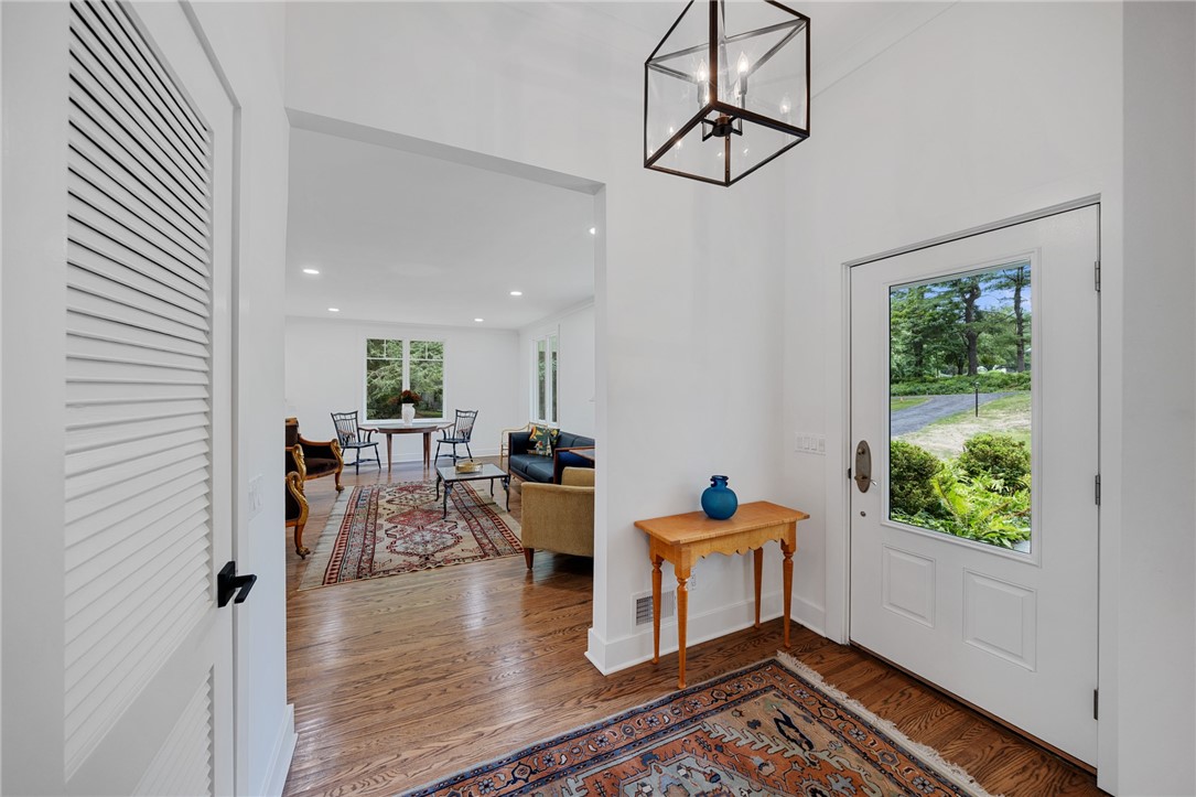 157 Crescent Hill Road Perinton, NY 14534 - Photo 15 of 47 SPACIOUS FOYER WITH POTTERY BARN LIGHT FIXTURE & H