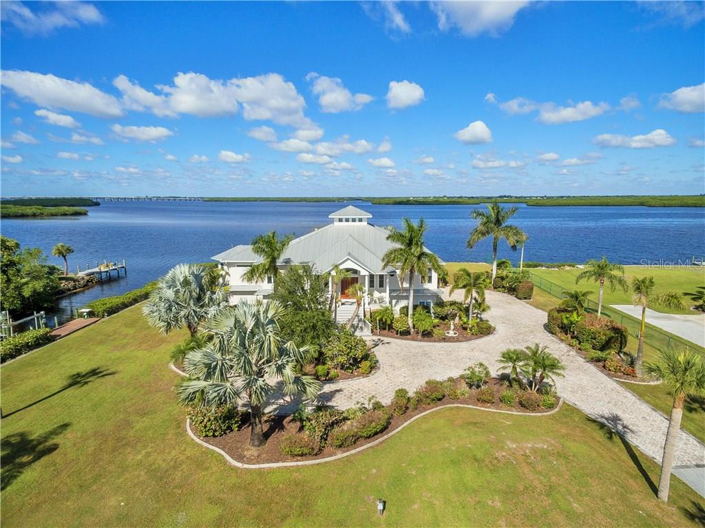 Riverfront living at it's best ! Acreage, Privacy, over 600 ft of Sailboat Water not to mention Fantastic Water Views from Every Room.