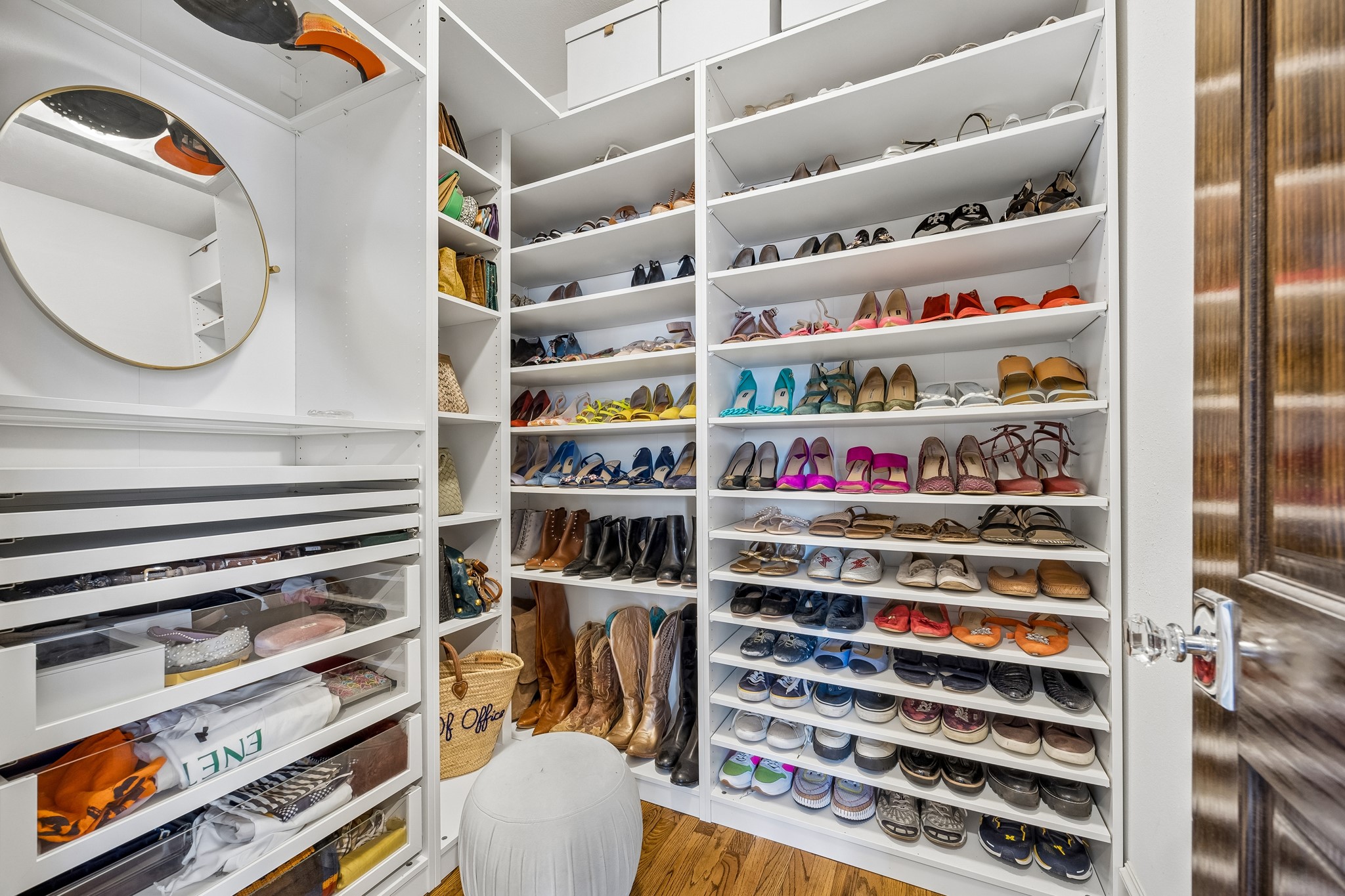 335 West 23rd Street Houston, TX 77008 - Photo 22 of 40 a view of walk in closet with clothes and shoes