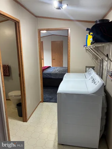 a en suite bathroom with a sink and toilet