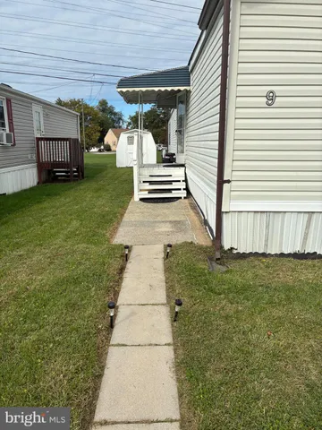 a view of a backyard with a garden