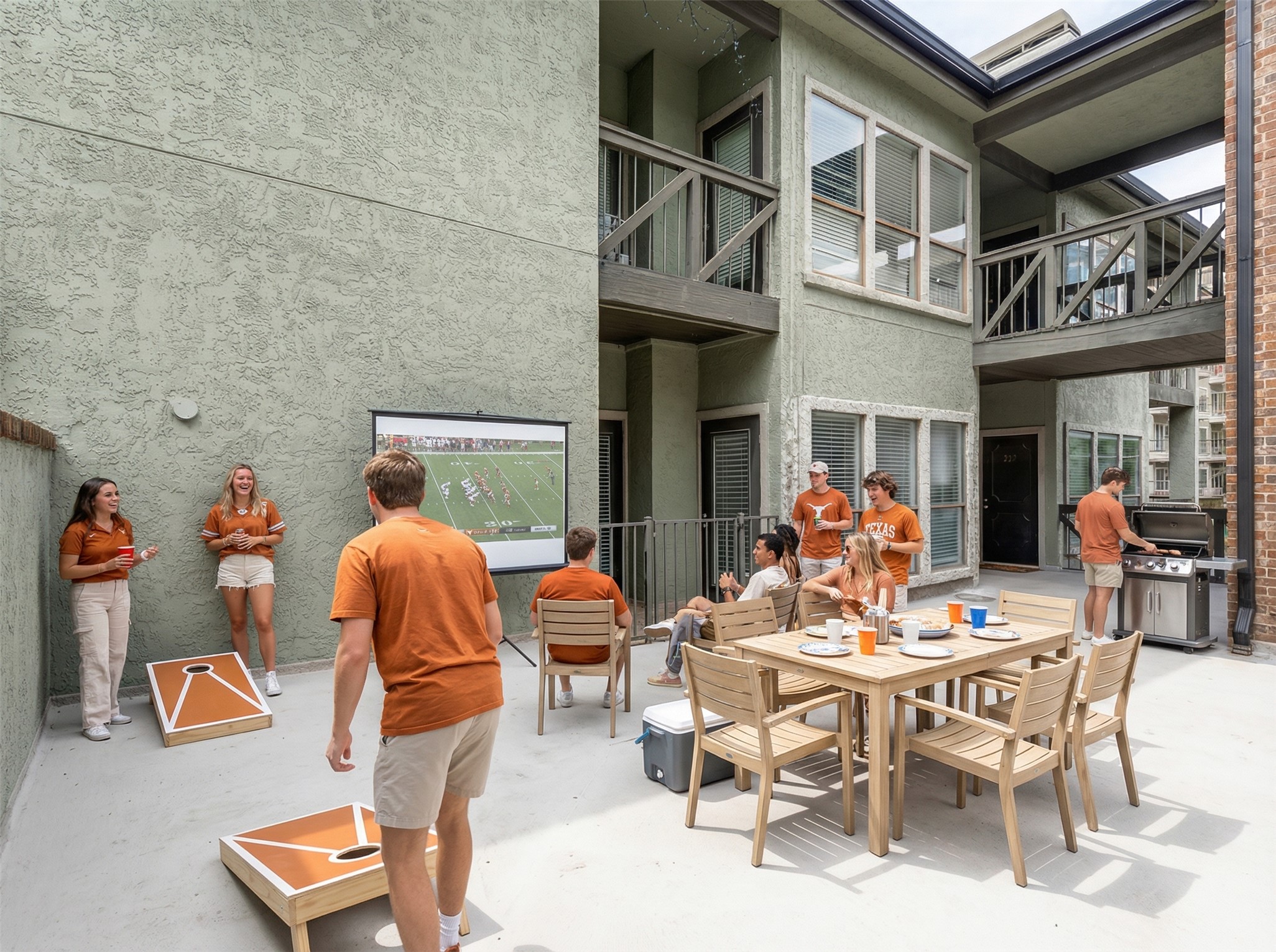 807 West 25th Street, Unit 214 Austin, TX 78705 - Photo 12 of 26 a view of a patio with dining table and chairs