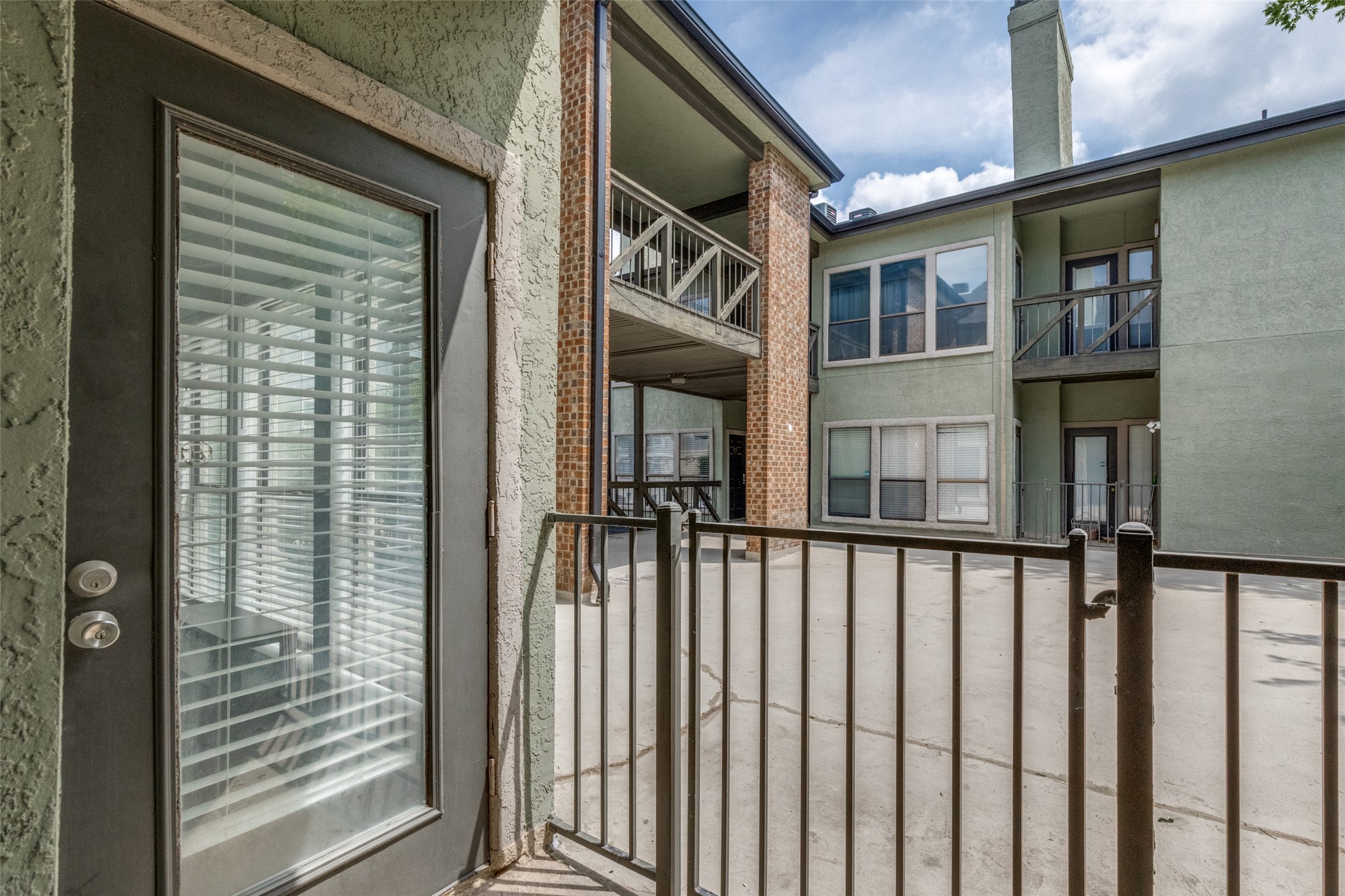 807 West 25th Street, Unit 214 Austin, TX 78705 - Photo 5 of 26 a view of a balcony from door