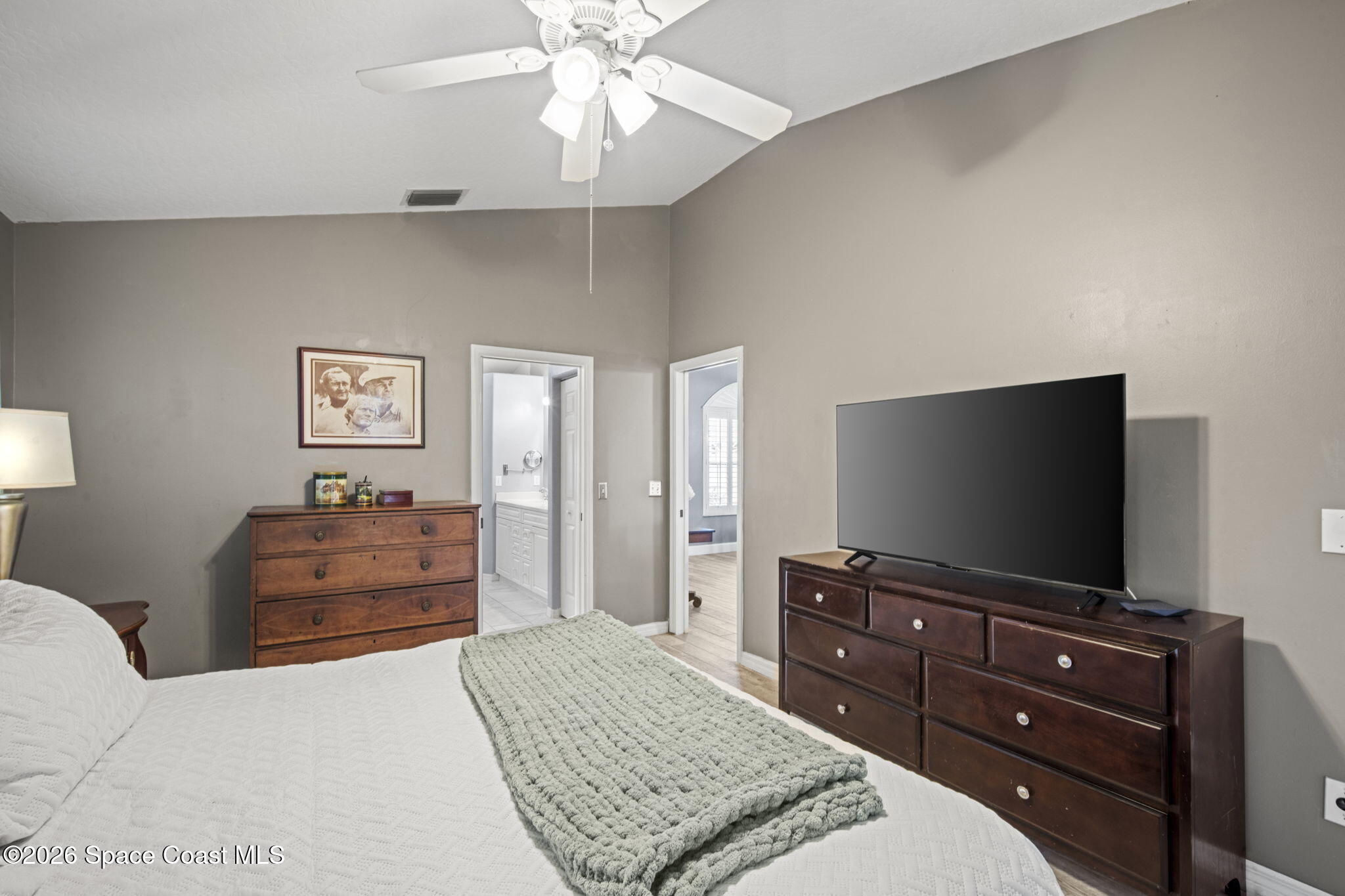472 Arbor Street Sebastian, FL 32958 - Photo 14 of 33 a living room with furniture and a flat screen tv