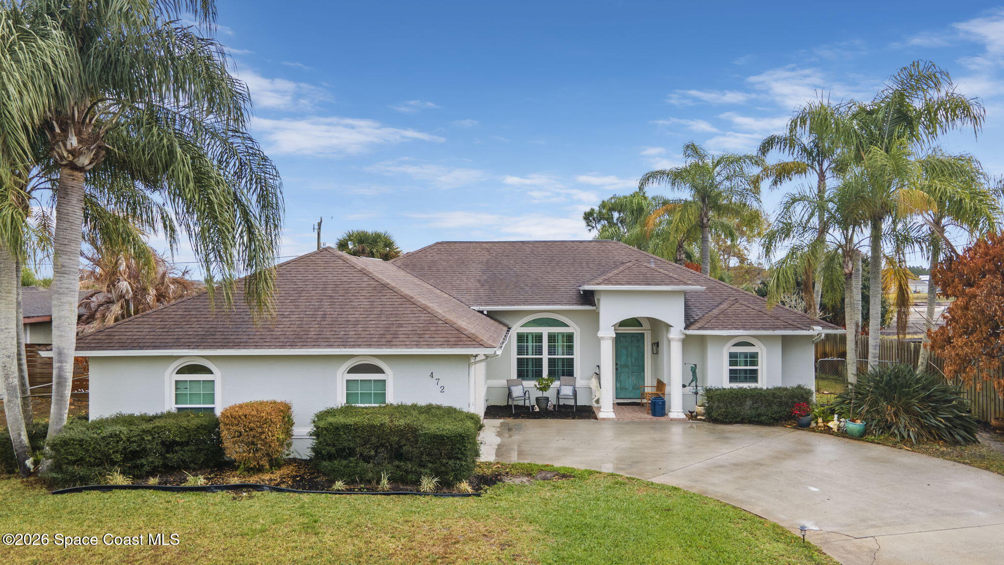 472 Arbor Street Sebastian, FL 32958 - Photo 2 of 33 front view of a house with a yard