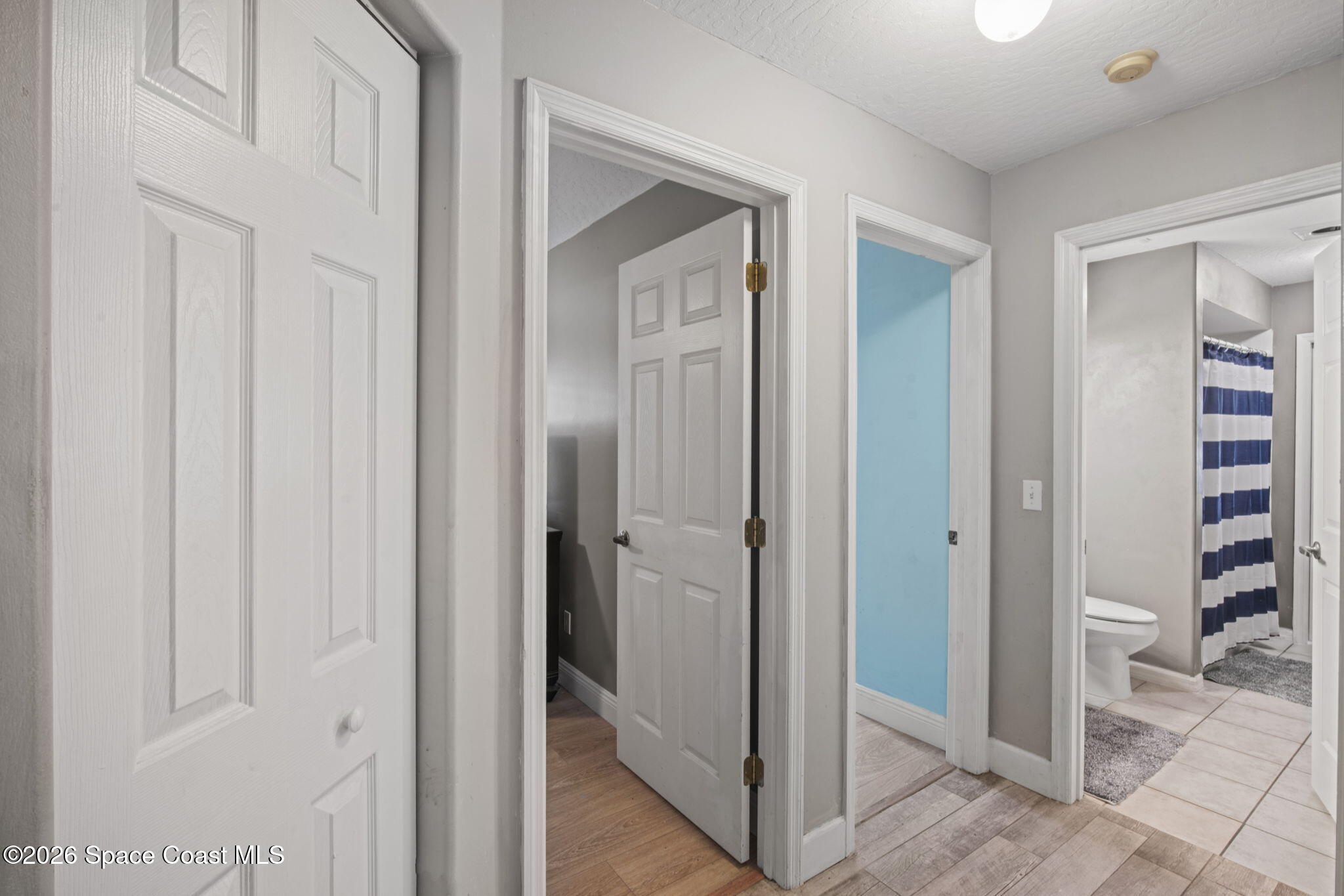 472 Arbor Street Sebastian, FL 32958 - Photo 22 of 33 a view of a hallway with closet and bathroom