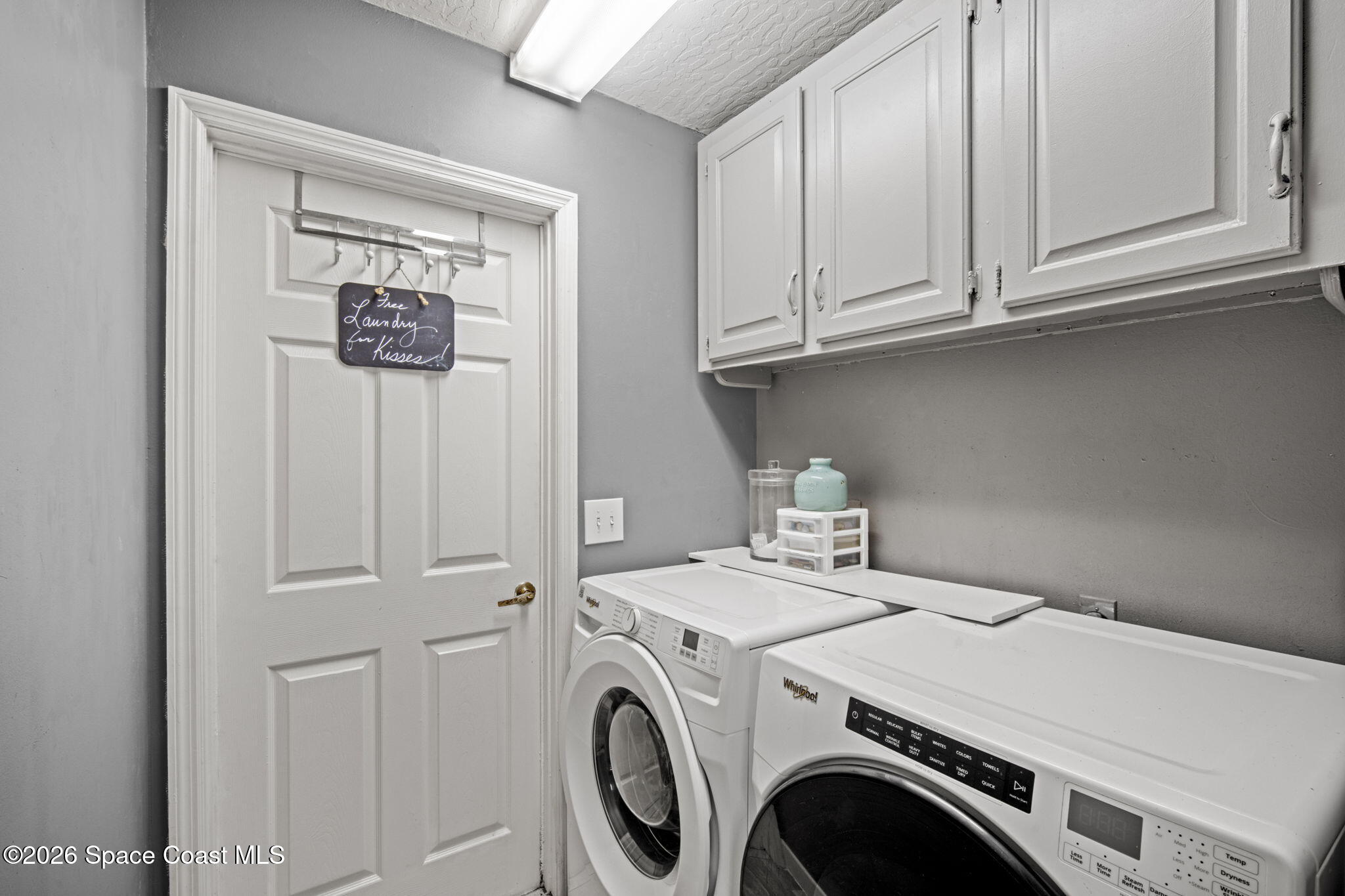 472 Arbor Street Sebastian, FL 32958 - Photo 24 of 33 a utility room with dryer and washer