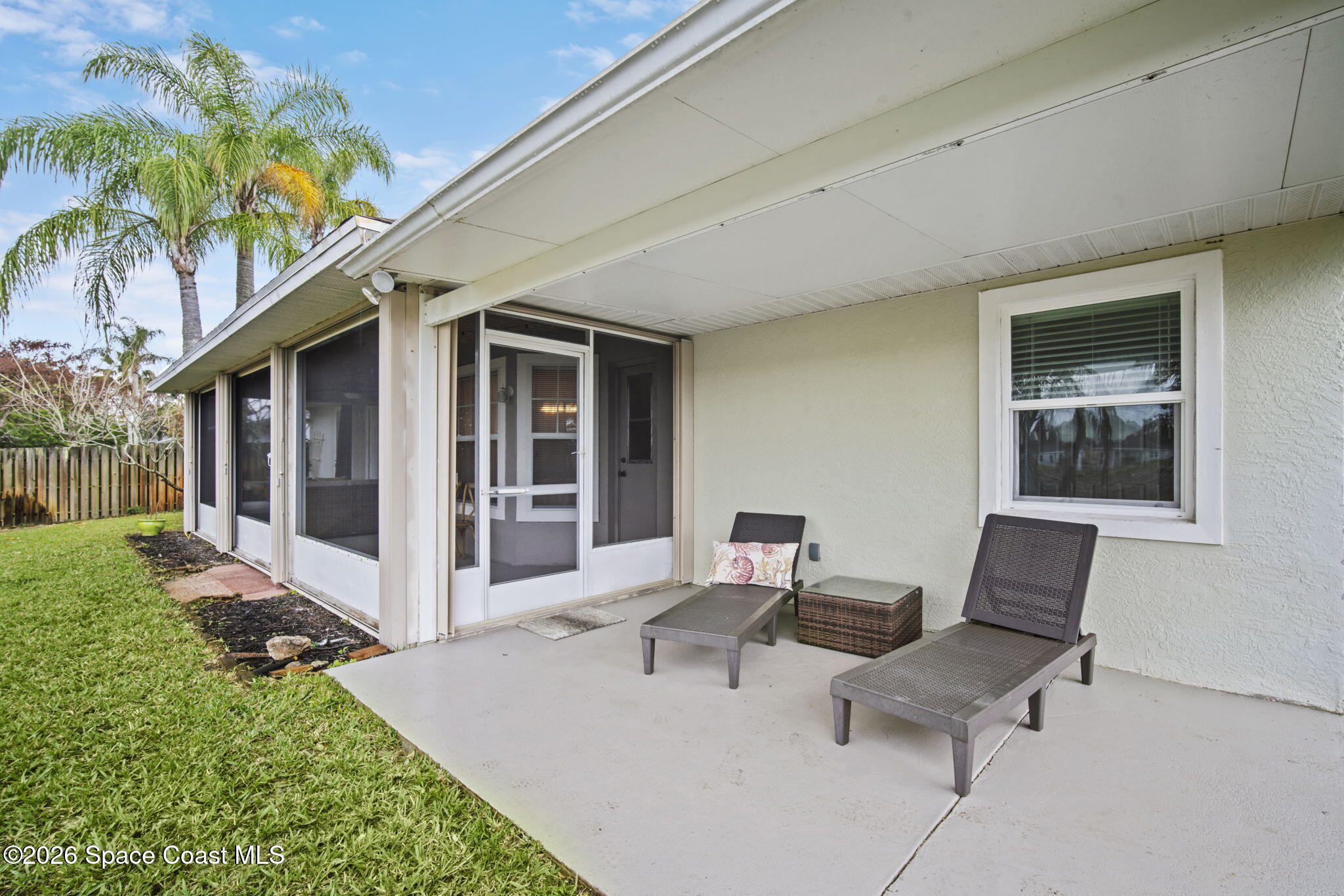 472 Arbor Street Sebastian, FL 32958 - Photo 27 of 33 a building outdoor space with patio furniture
