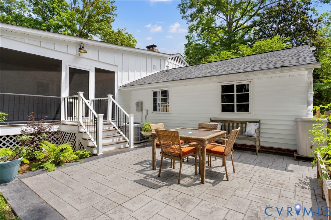 3136 Old Quarry Road Richmond, VA 23225 - Photo 17 of 39 Stamped concrete patio with a screened porch acces