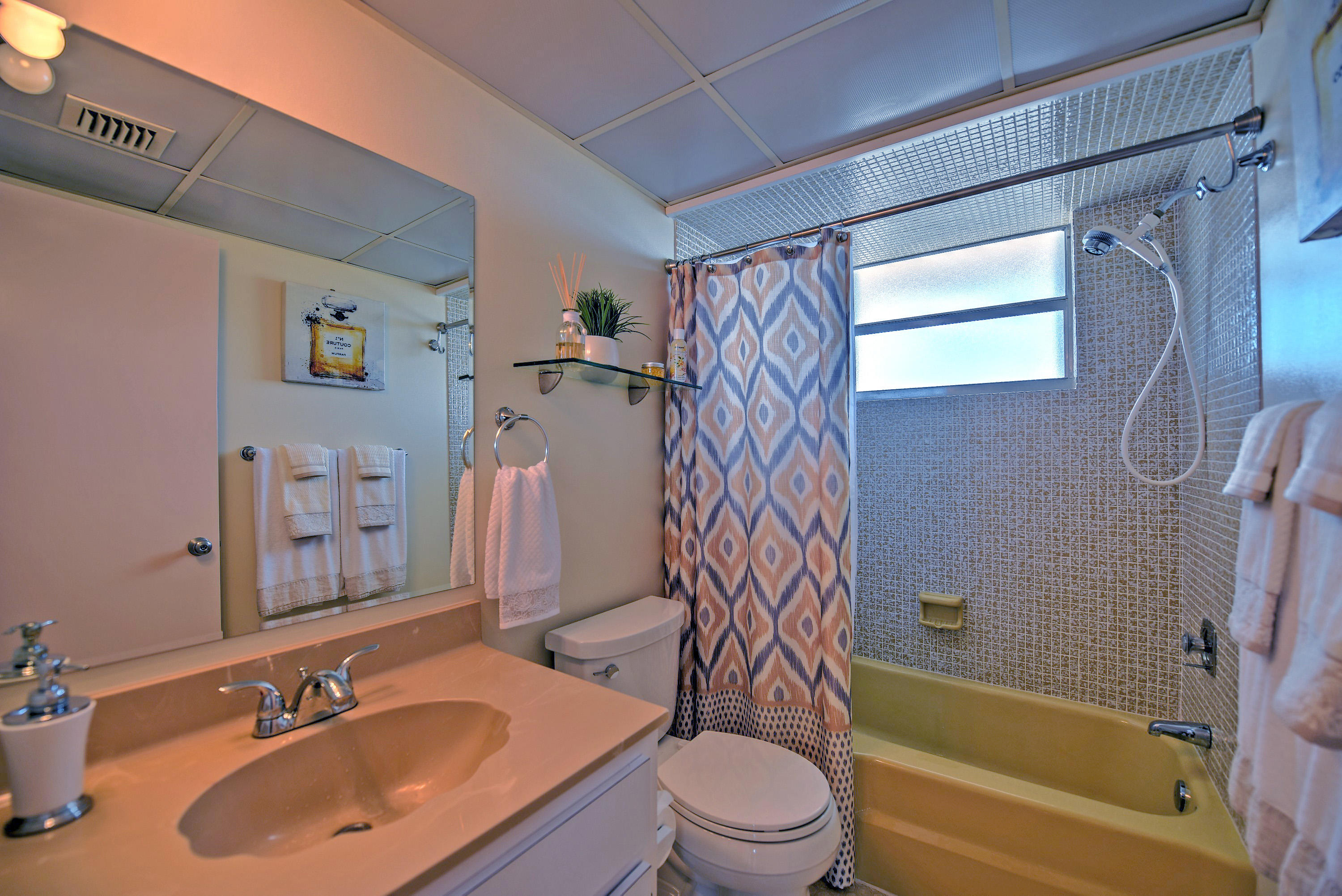 200 Harborview Drive, Unit PH 4 Tavernier, FL 33070 - Photo 16 of 33 a bathroom with a sink toilet and shower