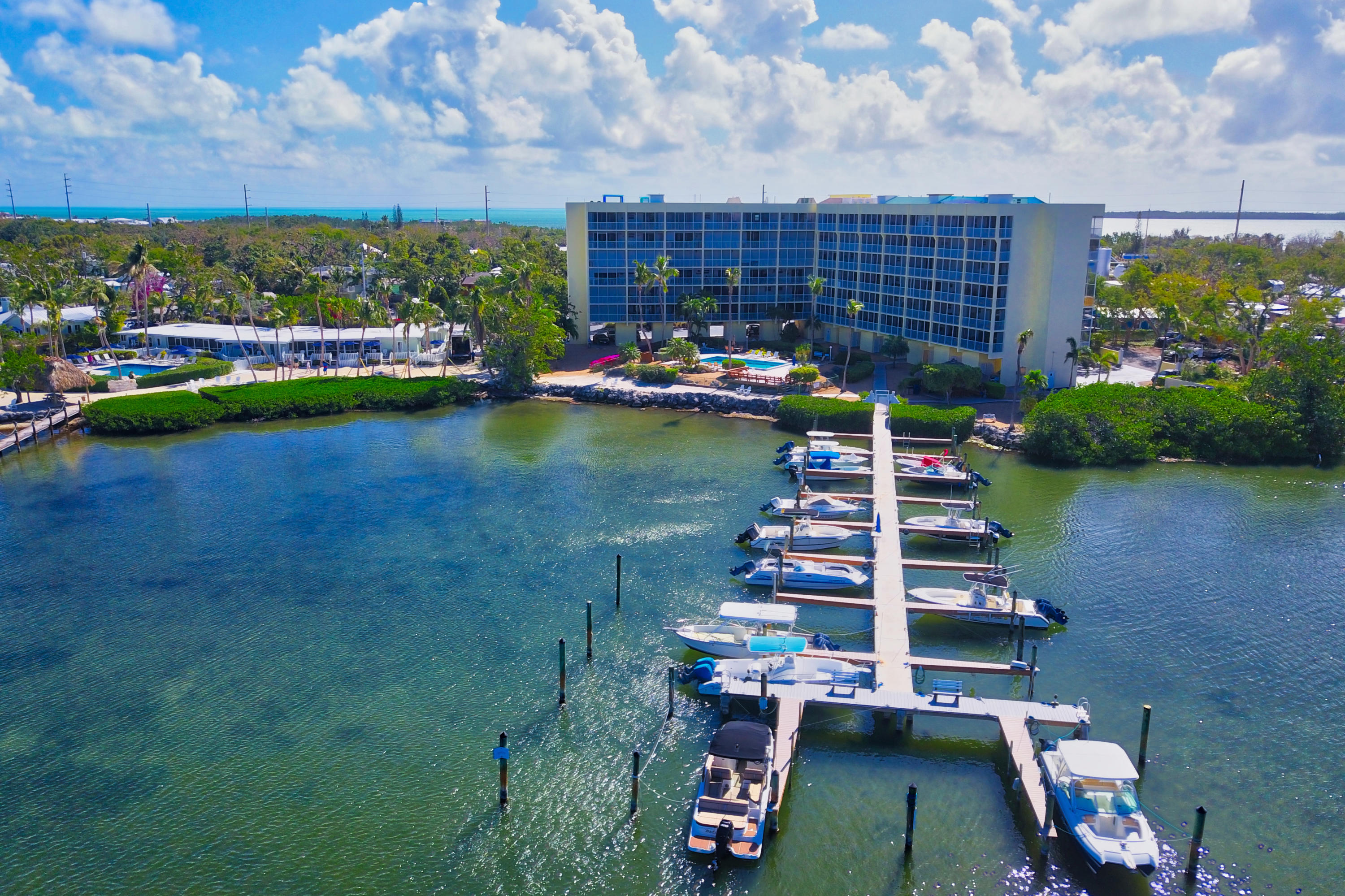 200 Harborview Drive, Unit PH 4 Tavernier, FL 33070 - Photo 4 of 33 a front view of a house with a garden