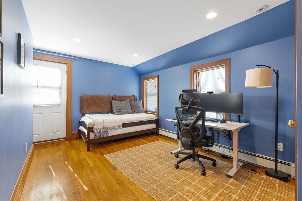 200 Washington Street Boston, MA 02135 - Photo 12 of 27 a bedroom with a bed and a window