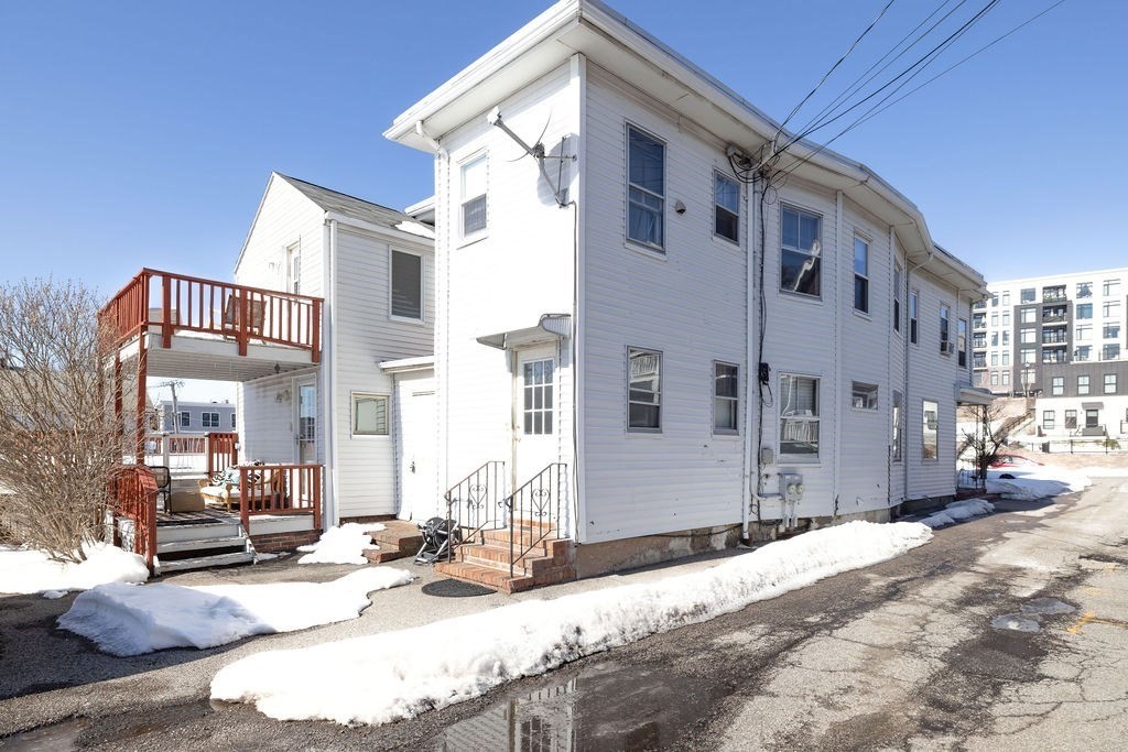 200 Washington Street Boston, MA 02135 - Photo 26 of 27 a view of a house with a patio