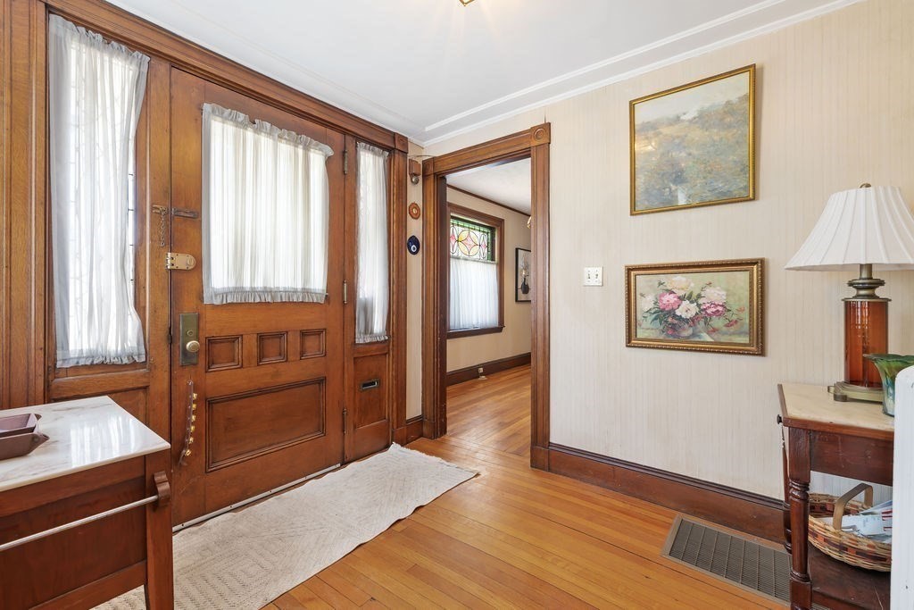 200 Washington Street Boston, MA 02135 - Photo 3 of 27 a room with window and furniture