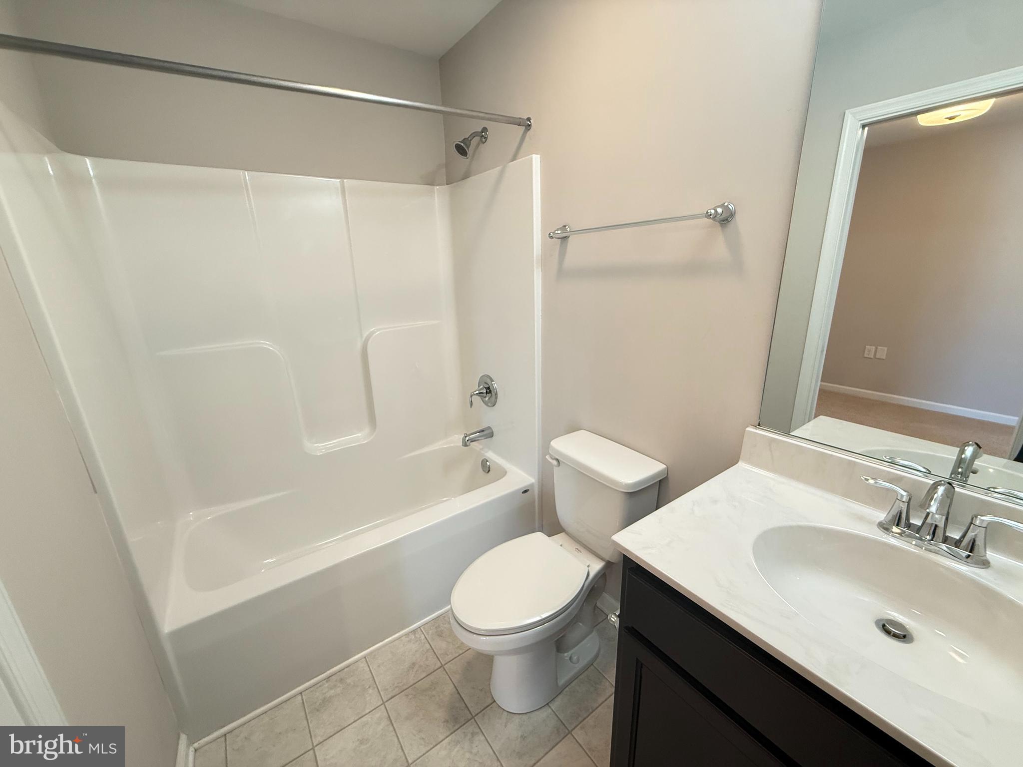 217 Brooks Circle Winchester, VA 22601 - Photo 8 of 9 a bathroom with a sink a toilet and shower