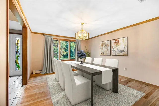 a kitchen with stainless steel appliances granite countertop a refrigerator and a stove