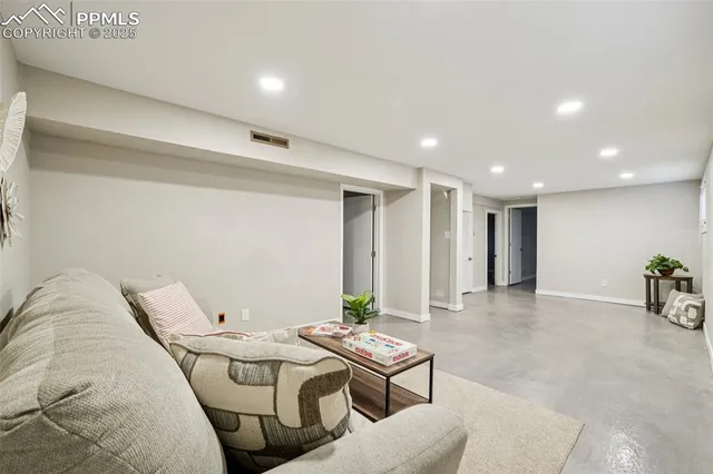 a workspace with furniture and window