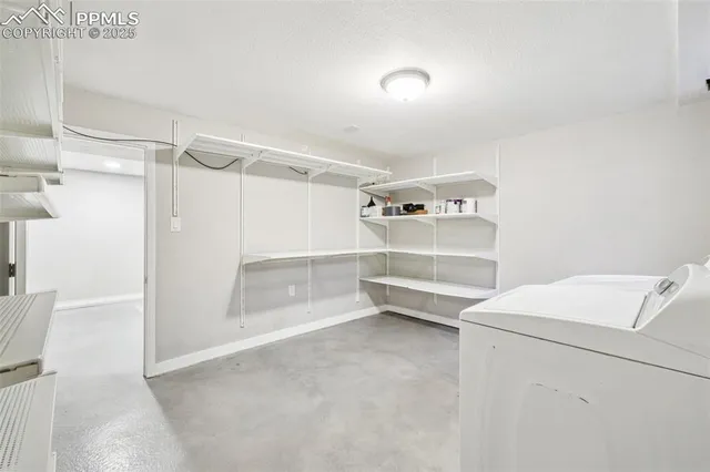 a utility room with cabinets