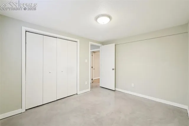 a bathroom with a large tub and shower