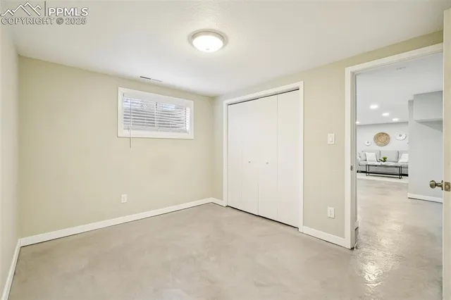 a view of a house with a yard and porch