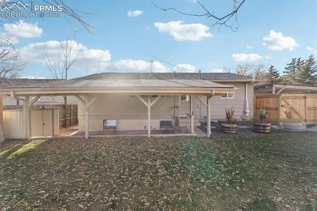 a view of a backyard of the house