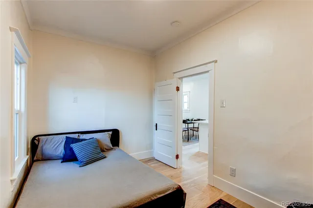 a bedroom with a bed and closet