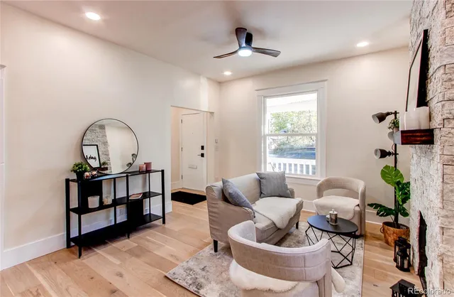 a living room with furniture and window