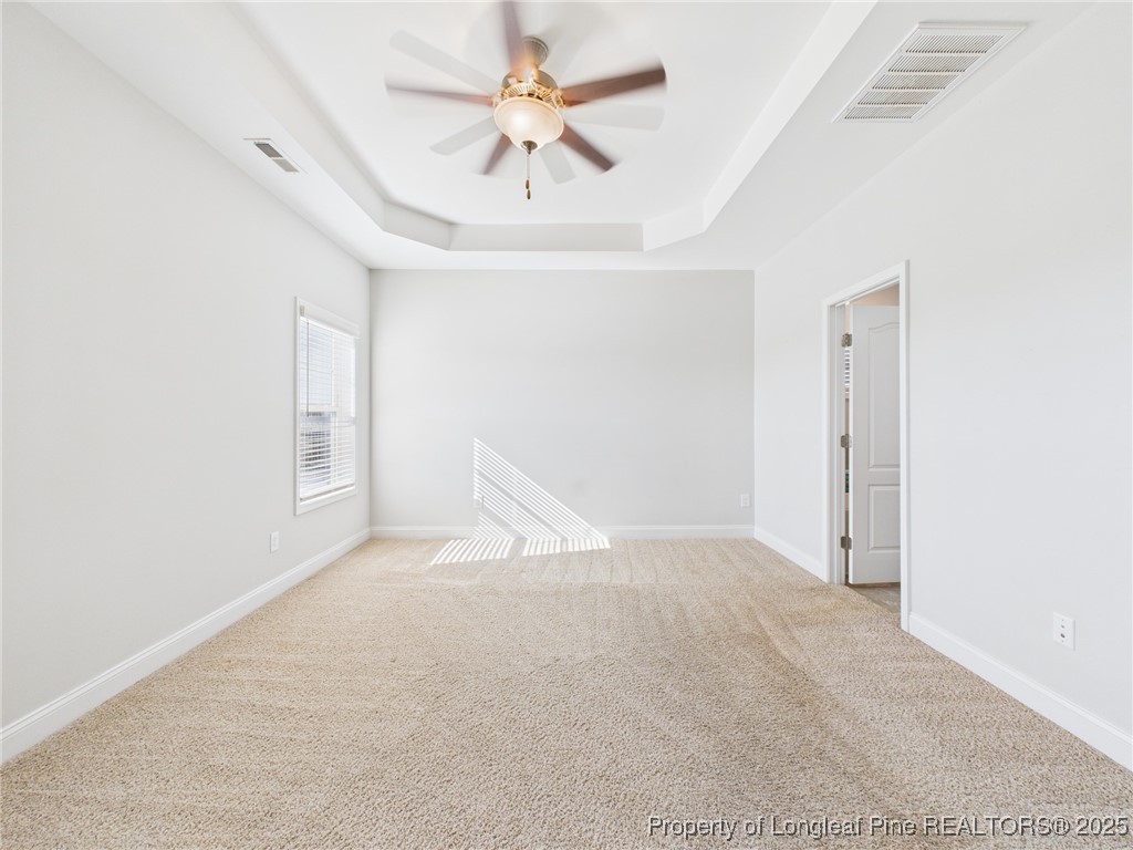 3149 Hunting Lodge Road Fayetteville, NC 28306 - Photo 17 of 49 an empty room with a ceiling fan and a window