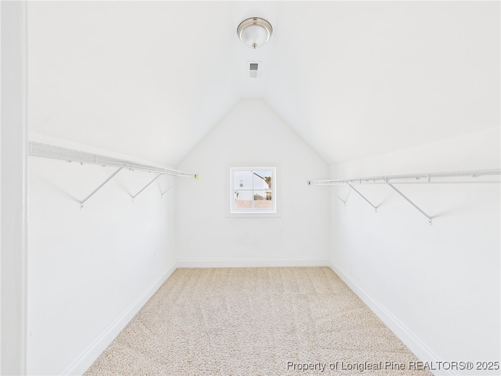 3149 Hunting Lodge Road Fayetteville, NC 28306 - Photo 36 of 49 a view of a room with racks on the wall