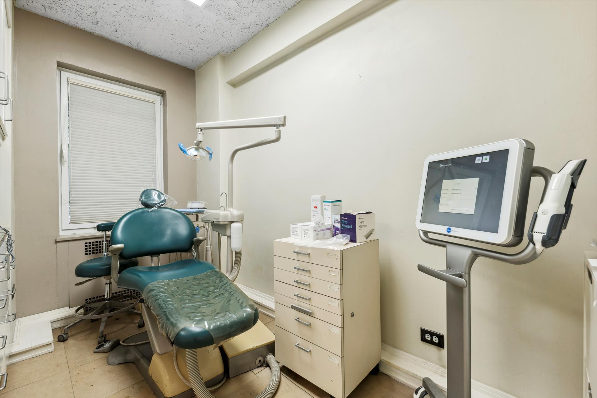 880 5th Avenue, Unit 1J Manhattan, NY 10021 - Photo 7 of 12 a living room with furniture