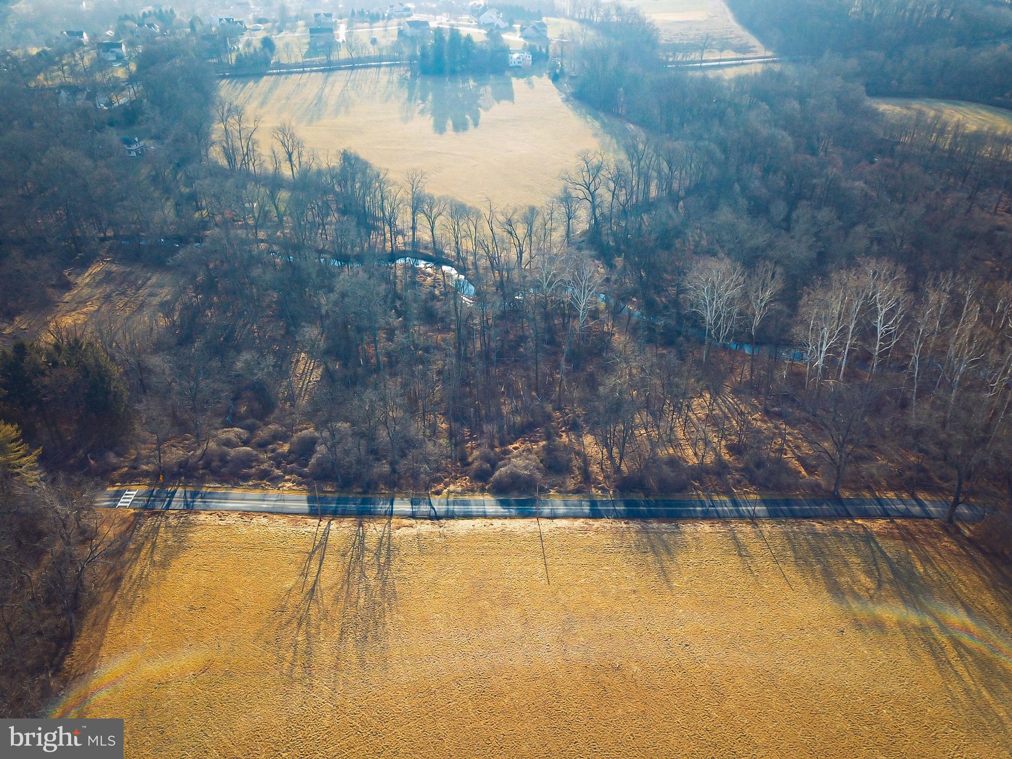 a view of a swimming pool and an outdoor space