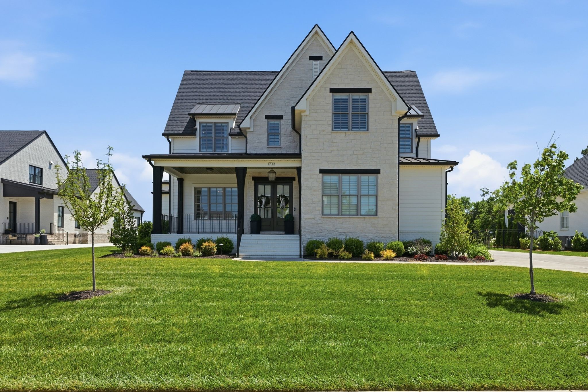 1733 Rigsby Avenue Murfreesboro, TN 37129 - Photo 1 of 57 a front view of a house with a yard