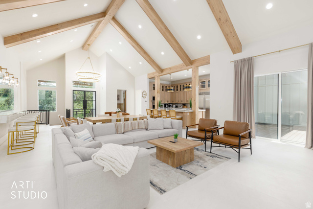 1188 South Old Trappers Loop Road Huntsville, UT 84317 - Photo 26 of 92 Spacious open-concept living area featuring vaulted ceilings with exposed wood beams, recessed lighting, and expansive glass sliding doors