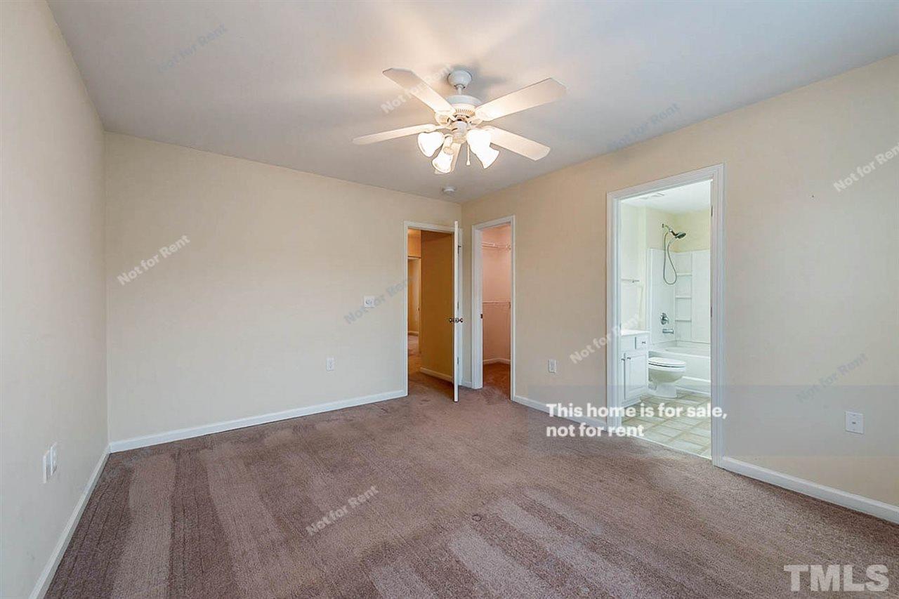 2608 Andover Glen Road Raleigh, NC 27604 - Photo 13 of 19 wooden floor in an empty room with a window