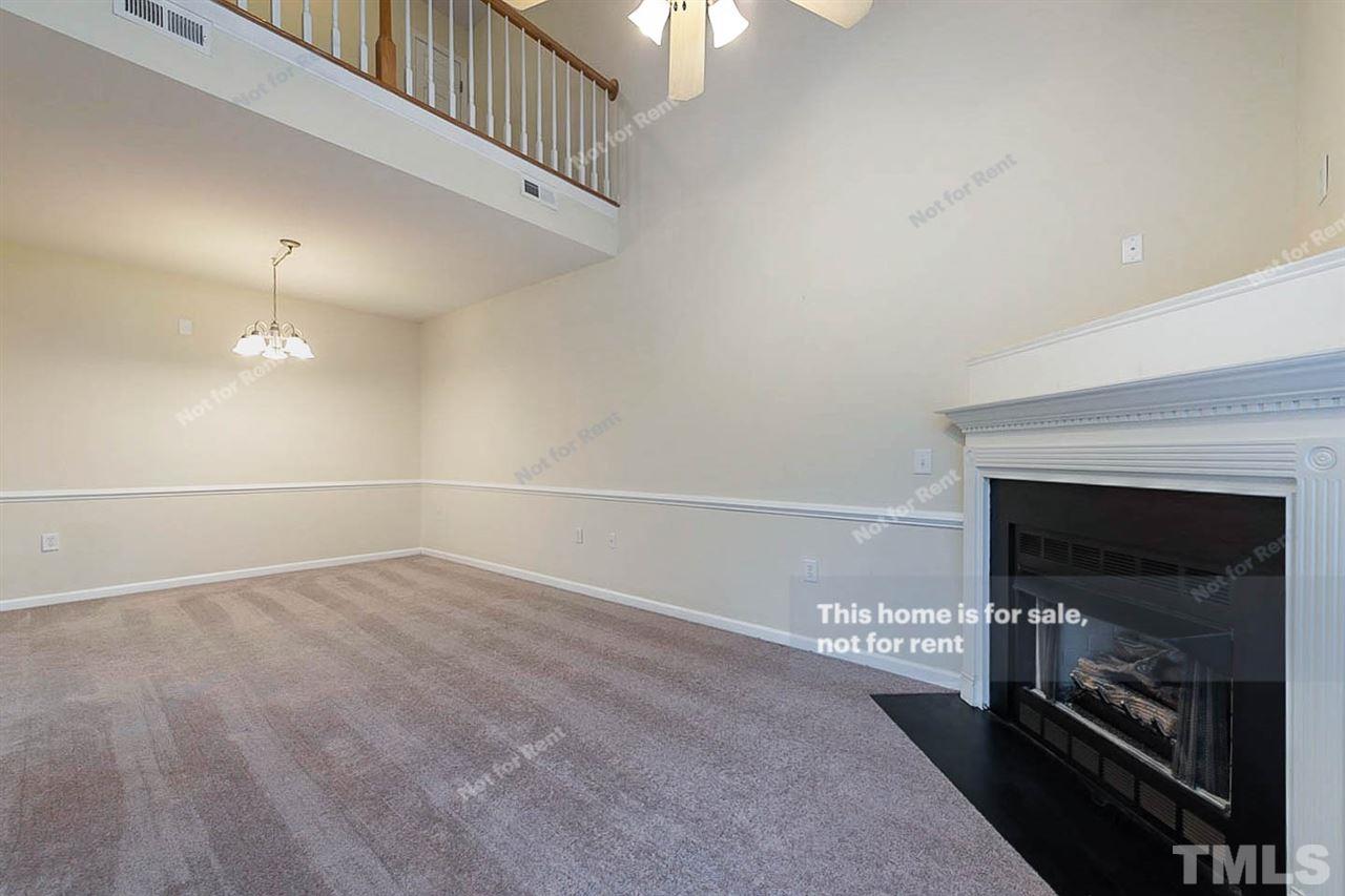 2608 Andover Glen Road Raleigh, NC 27604 - Photo 10 of 19 an empty room with windows