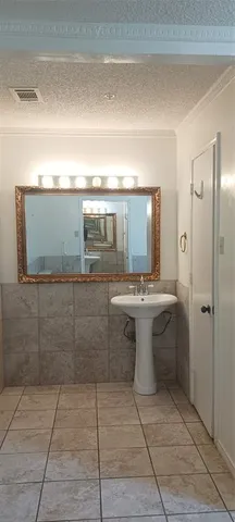 a bathroom with a shower and a toilet