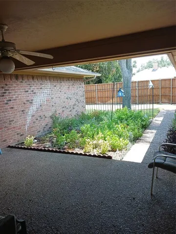 a view of a wooden fence