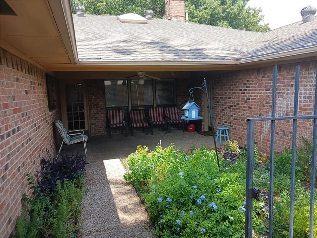 a view of a backyard with a small cabin