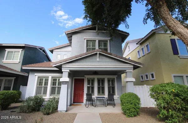 front view of a house with a small yard