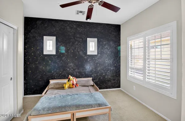 a view of a kitchen with a sink and a window