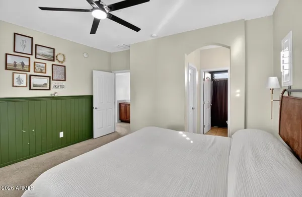 a bathroom with a sink double vanity and a mirror