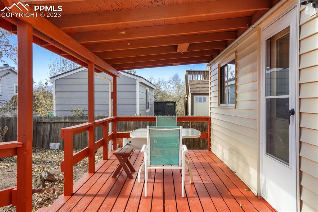 6385 Bismark Road Colorado Springs, CO 80922 - Photo 19 of 25 a balcony view with a seating space