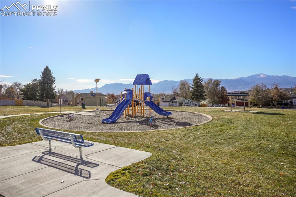 6385 Bismark Road Colorado Springs, CO 80922 - Photo 21 of 25 a view of outdoor space with swimming pool and seating