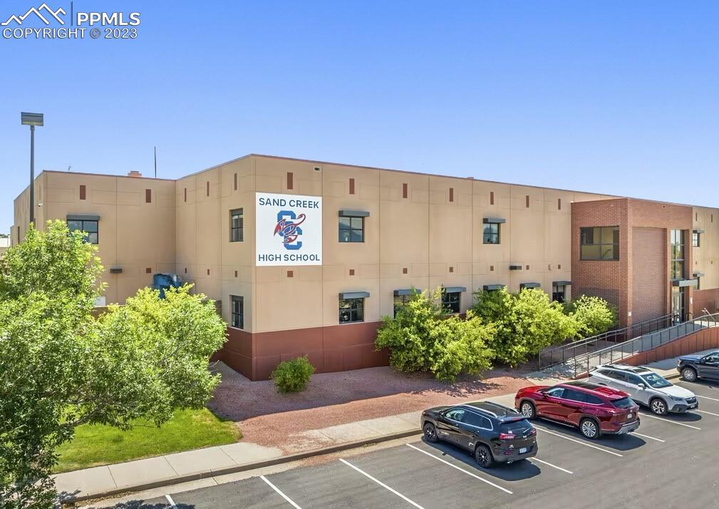 6385 Bismark Road Colorado Springs, CO 80922 - Photo 25 of 25 a car parked in front of a building