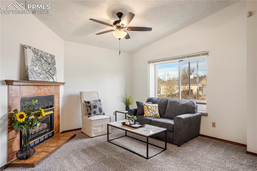6385 Bismark Road Colorado Springs, CO 80922 - Photo 3 of 25 a living room with furniture and a window