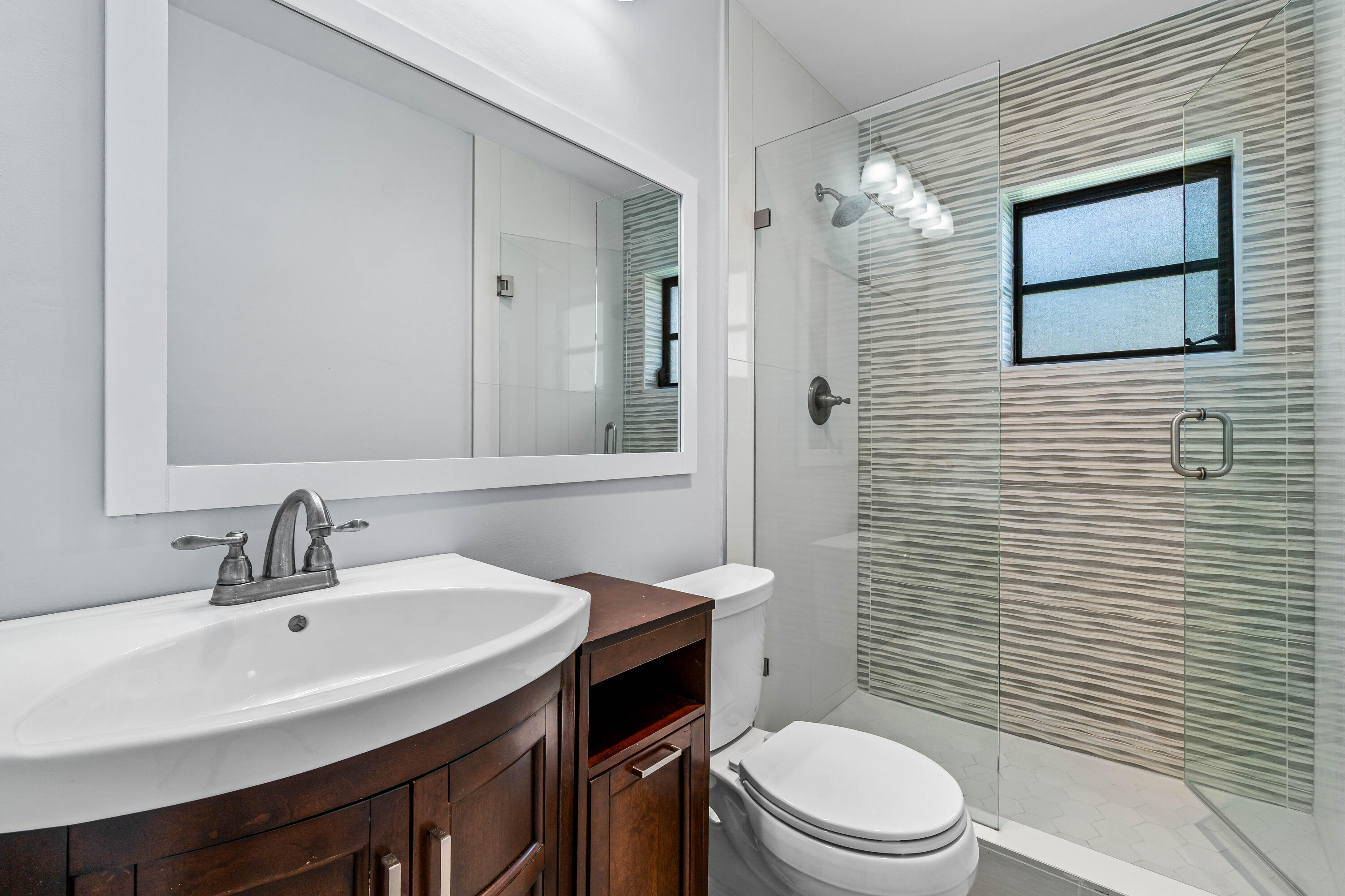 4897 Hawkwood Road, Unit A Boynton Beach, FL 33436 - Photo 17 of 25 Guest Bathroom