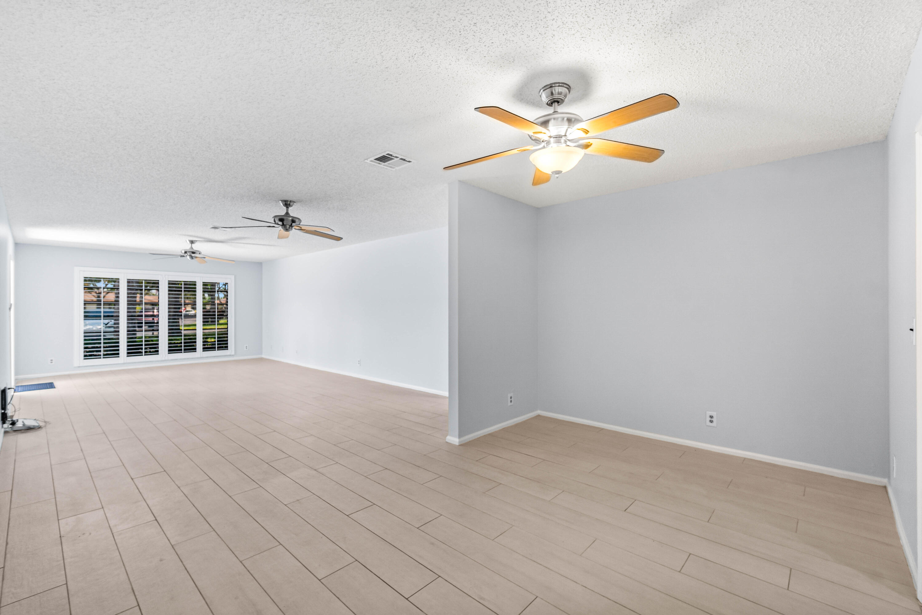4897 Hawkwood Road, Unit A Boynton Beach, FL 33436 - Photo 10 of 25 Dining to Living room