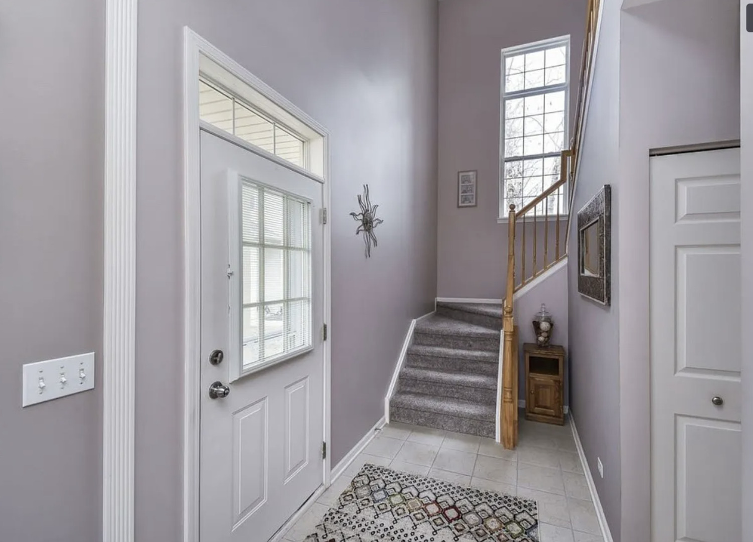 2221 Sunrise Circle, Unit 2221 Aurora, IL 60503 - Photo 3 of 15 a view of entryway with furniture and windows